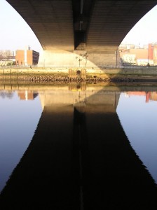 Beneath the Kingston Bridge, a dramatic reflection in the water