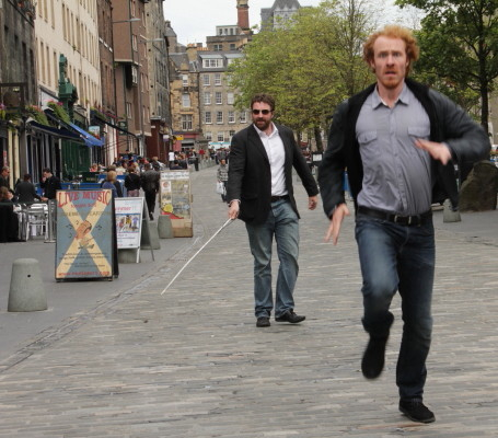 Blind Professor Jamie MacDonald chases Harry Gooch through the Grassmarket on Edinburgh Comedy Tour