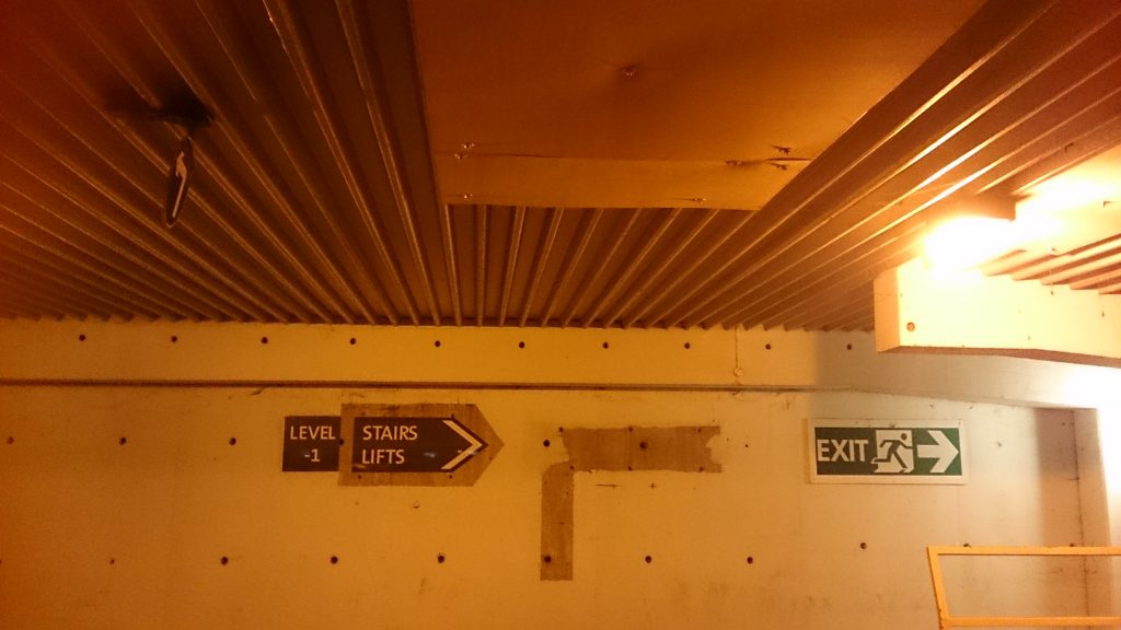 stairway signs under lighting