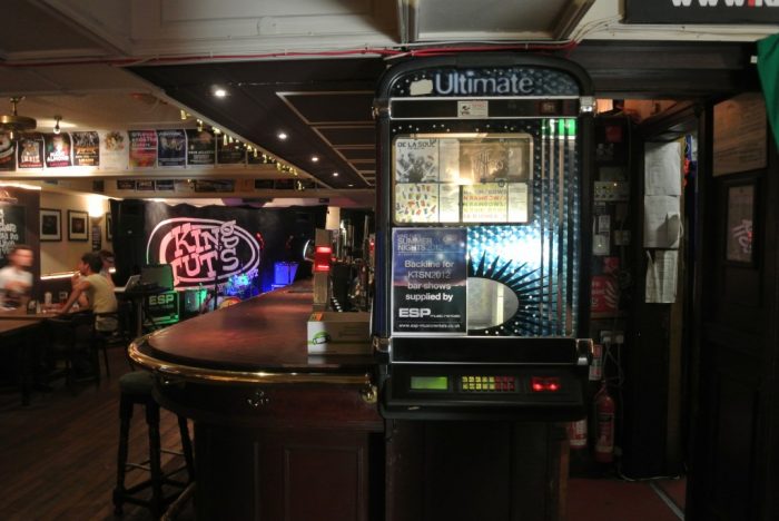 Inside King Tut's Wah Wah Hut, passing the famous jukebox