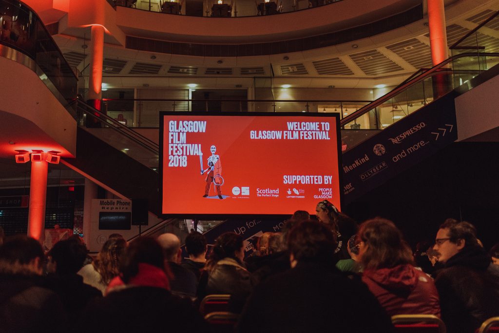 A packed audience ready for secret screening of Dawn of the Dead in Buchanan Galleries shopping centre: image Ingrid Mur for Glasgow Film Festival