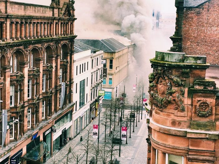A striking image looking down on Sauchiehall Street, smoke billowing across the newly tree-planted pedestrian area