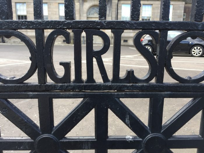 Wrought iron gate says 'Girls' at the girls' entrance to the former Leith Academy secondary school